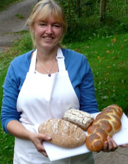 A student with 2 sourdoughs and a long fermented challah